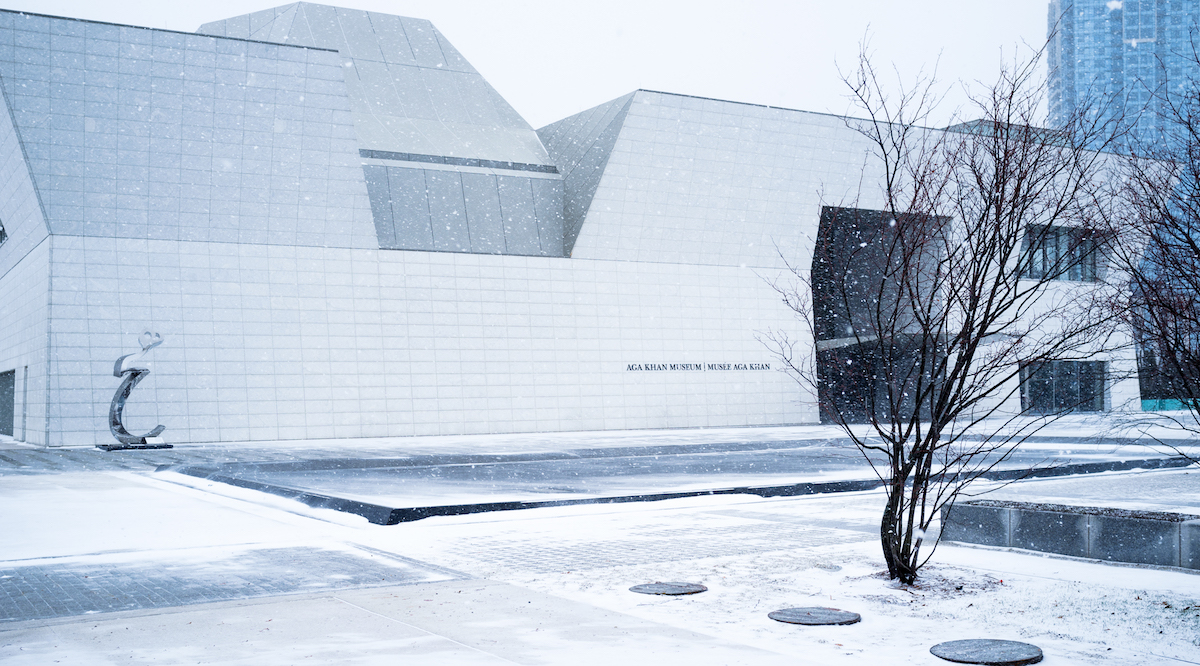 Outside the Aga Khan Museum on a cloudy, snowy day.